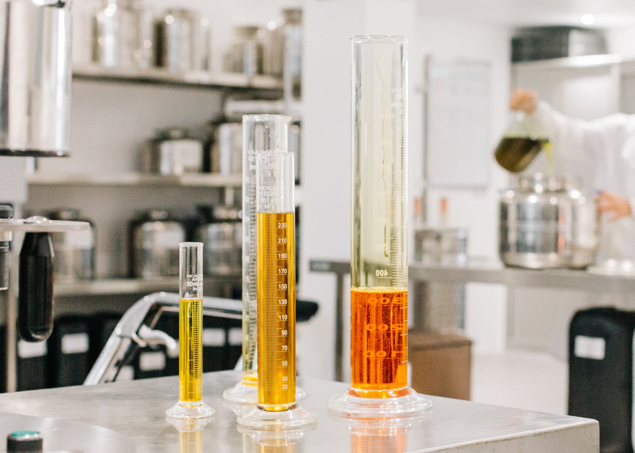 Inlight organic raw oils in test tubs, lab in Cornwall, UK