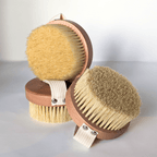 Wooden Body Brushes in a stack. Brushes for dry body brushing Inlight Beauty
