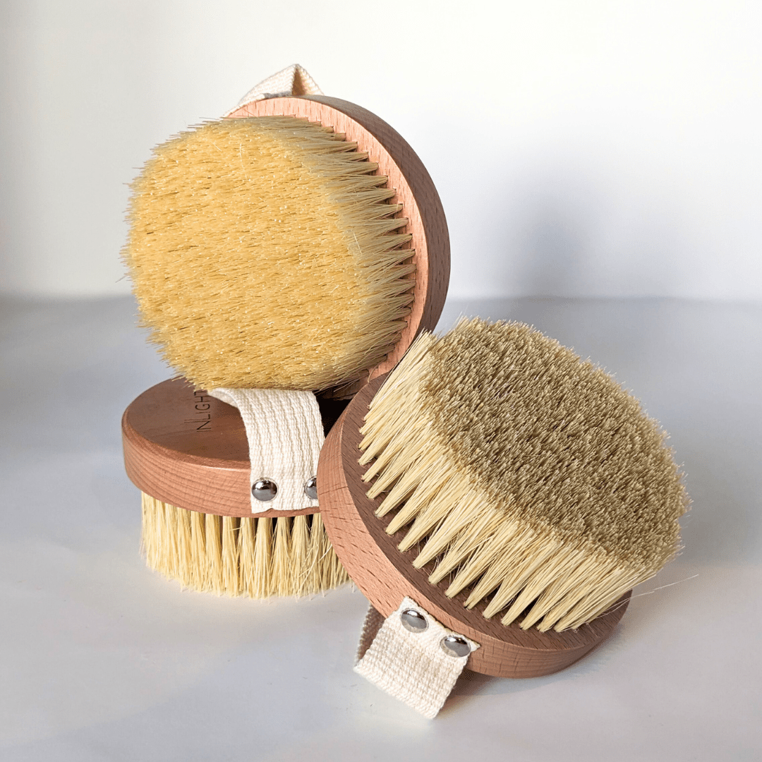 Wooden Body Brushes in a stack. Brushes for dry body brushing Inlight Beauty